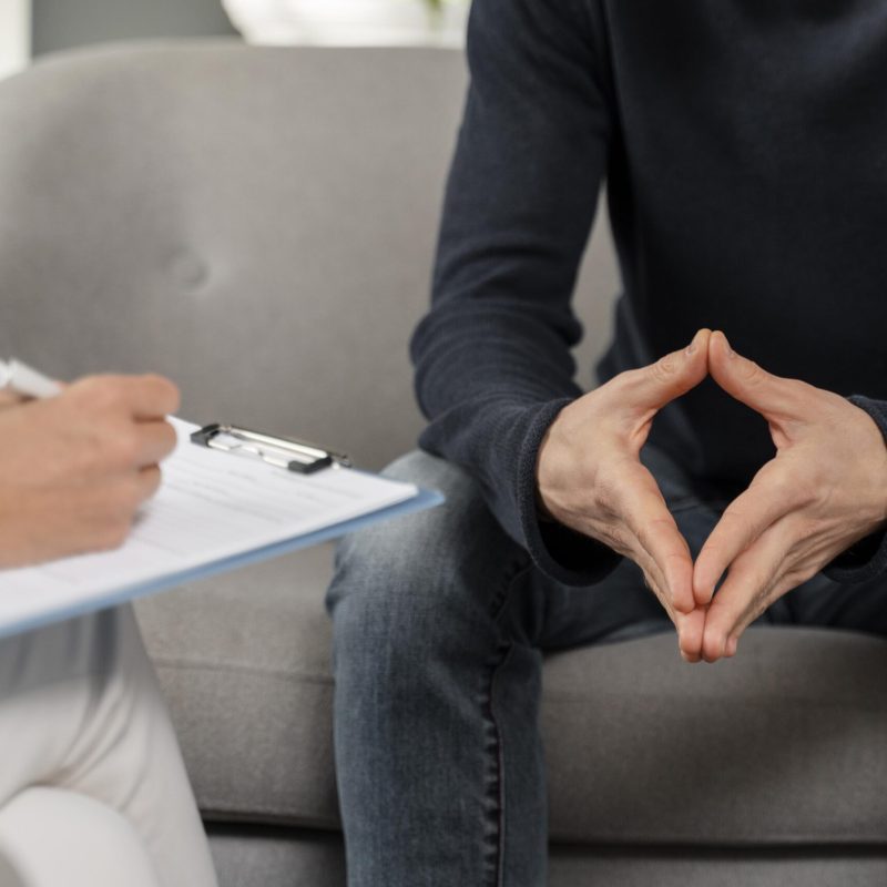 man-talking-therapist